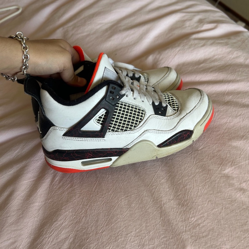 Black and White Sneakers with orange Highlights